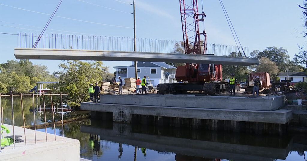 workers building a bridge
